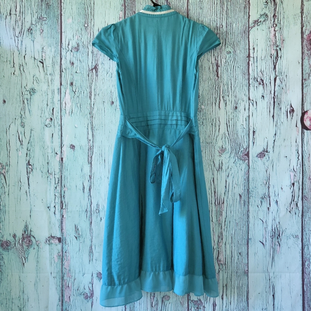 Emerald Ruffled Yoke Bib Ribbon Dress - Picture 6 of 8